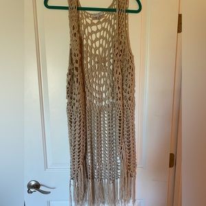 Blush crochet vest with bottom fringe. Perfect for Nashville or country concert